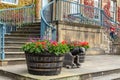 Decorative planters with red geraniums. Royalty Free Stock Photo