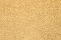 Decorative plaster background. Outdoor Conserving Decorative Textured Brown Yellow Plaster background Royalty Free Stock Photo