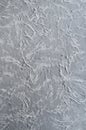Decorative plaster on wall, textured background close up Royalty Free Stock Photo