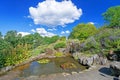 Decorative pond with waterfall and flowers at Oslo city park Royalty Free Stock Photo