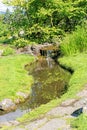 Decorative pond with waterfall at Oslo city park Royalty Free Stock Photo