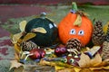 Decorative pumpkin heads and spiders made of chestnuts and matches