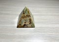 Decorative pyramid of onyx close-up. Pyramid of beautiful onyx stone