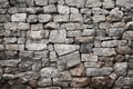Decorative real stone wall surface with uneven cracks, ideal background Royalty Free Stock Photo