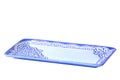 Decorative rectangular blue porcelain plate with floral pattern isolated on white background. Clipping path. Ceramic dish Royalty Free Stock Photo