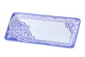 Decorative rectangular blue porcelain plate with floral pattern isolated on white background. Clipping path. Ceramic dish Royalty Free Stock Photo