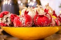 Decorative red pomegranate fruits in a bowl. Shallow depth of field Royalty Free Stock Photo