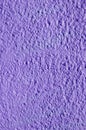 Decorative relief purple plaster on wall Royalty Free Stock Photo