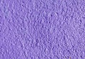 Decorative relief purple plaster on wall Royalty Free Stock Photo