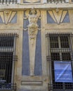 Decorative relief and sign outside the Palazzo Podesta or Nicolosio Lomelino at 7 Via Garibaldi in Genoa, Italy