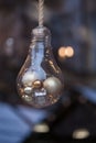 Decorative retro design edison light bulb. Christmas ornaments made from light bulbs. LED lamps in vintage and antique style