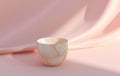 a decorative a decorative round marble cup on pink