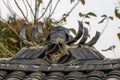Decorative sculptures of tiles on the roof of traditional Chinese tiled houses Royalty Free Stock Photo