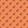 Decorative seamless pattern with amphibian frog silhouettes. Pastel coral background. Kids print