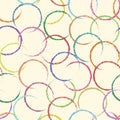 Decorative seamless pattern with colorful circles on pastel background. Grunge painted rings with different texture. Retro style. Royalty Free Stock Photo