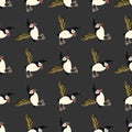 Decorative seamless pattern with hand drawn puffin bird silhouettes. Dark grey background. Simple design Royalty Free Stock Photo