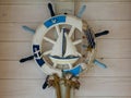 Decorative Ship\'s Helm on Wall Rustic Marine Style Sunlight Royalty Free Stock Photo