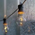 Light Bulb and Ice Crystals on a Frozen Glass Surface Royalty Free Stock Photo