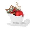 Decorative sleigh with wooden music notes and Christmas balls in sleigh isolated Royalty Free Stock Photo