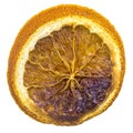 Slice of a dry stained orange on white background