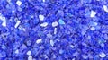 Decorative small blue shards of glass, close-up Royalty Free Stock Photo