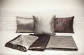 Decorative small pillow on the bed Royalty Free Stock Photo