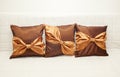 Decorative small pillow on the bed Royalty Free Stock Photo