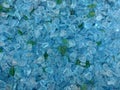 Decorative small turquoise shards of glass, close-up Royalty Free Stock Photo