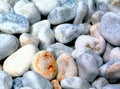 Decorative smooth white river stone pebbles in closeup view.