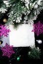 Decorative snowflake white and pink on black background. Christmas greeting card. Copy space. Top view. Royalty Free Stock Photo