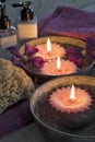Decorative spa still life with candles, soap, towels and sponge Royalty Free Stock Photo