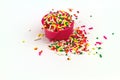 Decorative sprinkles sugar in pink cup