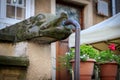 A decorative stone dragon water drain in Mariacka street in Gdansk