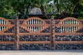 Brown decorative stone fence with baluster. against the house Royalty Free Stock Photo