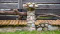 a decorative stone fence post for delimiting a private area. Royalty Free Stock Photo