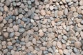 Decorative stone pebble background. round gravel texture garden