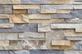 Decorative stone wall with varied rectangular blocks in neutral color tones Royalty Free Stock Photo
