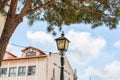 Decorative street metal lantern made in the old style stands on the main pedestrian HaMeyasdim street in Zikhron Yaakov city in