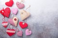 Decorative textile hearts on stone background. The concept of Valentine Day. Copy space for your text Royalty Free Stock Photo