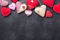 Decorative textile hearts on stone background. The concept of Valentine Day. Copy space for your text Royalty Free Stock Photo