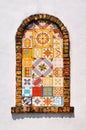 Decorative tiled arched window mosaic