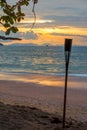 Decorative torch on the sandy beach of Thailand Royalty Free Stock Photo
