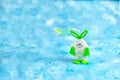 Decorative toy Easter Bunny on blue background Spring and Easter holiday concept with copy space Royalty Free Stock Photo