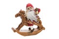 Decorative toy horse with Santa Claus close up isolated on white background. Royalty Free Stock Photo