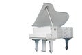 Decorative toy white grand piano Royalty Free Stock Photo
