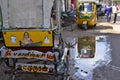 Decorative tricycle rickshaw with drawn god of war Kartikeya or Skanda or Kumari