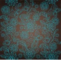 Decorative turquoise flower, brown background