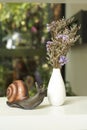 Decorative vase and snail