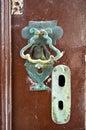 Decorative vintage old-fashioned metal door knocker and keyhole, antique door handles Turkey Istanbul Royalty Free Stock Photo