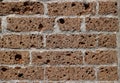 Decorative volcanic tuff bricks for exterior and interior wall . Close up. Royalty Free Stock Photo